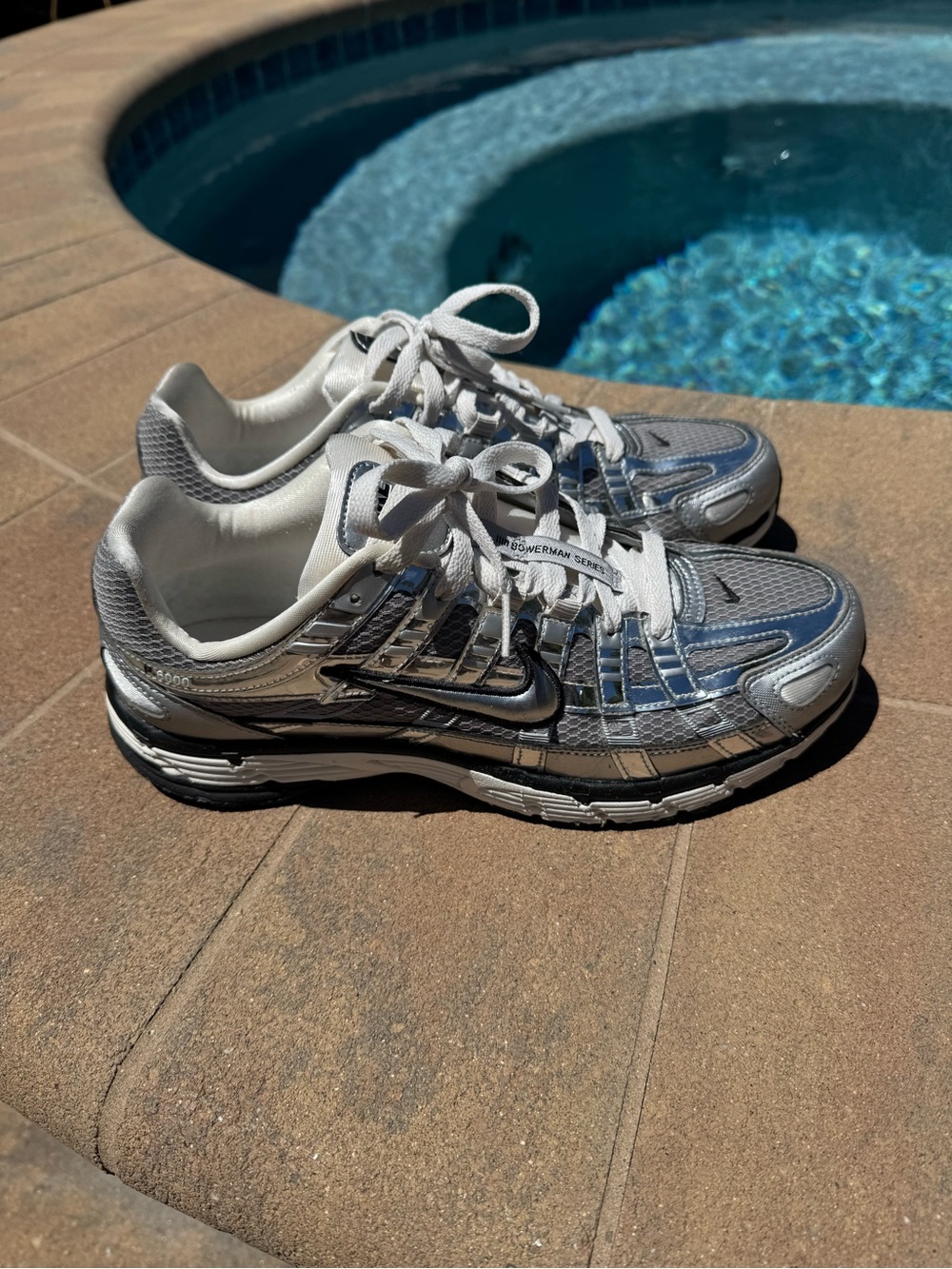 Men's Nike p-6000 metallic silver